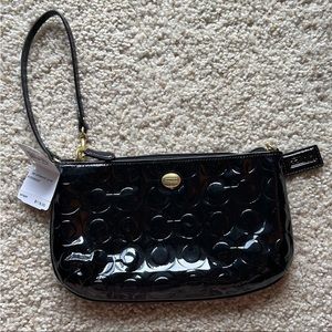 Coach classic pattern black wristlet